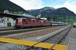 Gottardo 2016; Diverse Extrazge verkehrten fr die 80'000 Besucher, eingesetzt wurden diverse EWIV Pendel, eine Mehrfachtraktion Flirt, mehrere Dotra BoBo's mit 13 Wagen. Im GBT verkehrten v. a. IC 2000 Pendel. Im Bild erreicht der 13 Wagen lange EXT 30380 mit den fhrenden Re 420 197-6 (11197) und 420 196-8 (11196) den Bahnhof Airolo, 06.06.2016.

