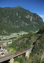 Freight train 66978 from Basel to Chiasso passes Amsteg, 3 August 2016.