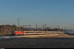 Re 4/4 II mit IR St. Gallen - Zürich am 6. Dezember 2016 bei Bassersdorf.