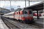 IC928 mit Re 4/4 II 11108 und RE1740 mit Ge 4/4 II 612  Thusis2 in Chur.