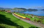 Re 420 258 mit einem Postzug am 06.10.2022 bei Immensee.