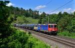 Re 421 374 + Re 420 502 mit einem Kesselzug am 07.06.2023 bei Villnachern.