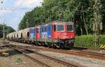 421 372-4 mit der Wagenlok 421 377-3 und Getreidezug in Fahrtrichtung Nienburg(Weser).