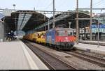 Bauzug mit Re 4/4 II (421 393-0) der SBB Cargo wartet auf Weiterfahrt im Bahnhof Olten (CH) auf Gleis 8 in südliche Richtung.