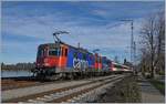 Die SBB Re 421 392-2 und eine weitere erreichen mit dem EC 191 Lindau Hbf. 

17. März 2019