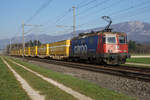 Re 421 390-6 mit dem morgendlichen Postzug bei Deitingen am 25.