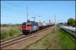 421 378-1 vor einem lpendelzug nach Rostock Seehafen.  Stralsund- Langendorf 01.05.09 