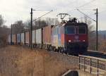 Re 421 386-4 poltert am 27.02.10 mit einem Containerzug durch Hamburg-Moorburg Richtung Hamburg-Waltershof.