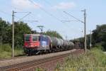 421 397-1 (SBB Cargo) fhrt am 2. August 2011 um 15:10 Uhr mit einem Gterzug durch Gro Gleidingen