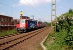 Kurz vorm Bahnbergang Klner Strae in Jchen kommt die SBB Cargo 421 376-5 mit einem sonderbaren Zug vorbei....an ihrem Hacken hngt die 421 380-6 wenn ich es richtig entziffert habe, die auch am Netz hngt, dahinter die 474 009-4 sowie die 474 005-2 und zwei Reisezugwagen eines im BW Mnchengladbach ansssigen Reiseunternehmens......7.Mai 2012