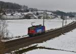 Re 421 376 bei einer Lz-Fahrt am 27.02.2013 bei Ergoldsbach.