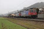 421 380-7 mit 421 XXX in Doppeltraktion vor einem Containerzug in Fahrtrichtung Norden.