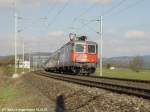 SBB Cargo Re 421 397-1 mit dem EC 193 Zrich HB-Mnchen Hbf am 15.03.03 bei Algetshausen-Henau