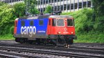 421 387-2 von SBB Cargo kommt als Lokzug aus Richtung Kln,Aachen-Hbf und fhrt in Aachen-West ein bei Regenwetter am Abend vom 13.6.2013.