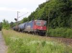 421 397-1 mit Kesselwagenzug in Fahrtrichtung Sden.