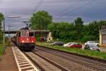 Durchfahrt am Abend des 22.05.2014 von SBB Cargo Re 421 388-0 mit dem Capital-Schotterzug nach Kehl auf der KBS 703 in Orschweier.