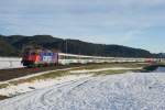 Mit den ersten Sonnenstrahlen des Tages erschien am 09.11.2014 die Re 421 378-1 mit dem Voralpen-Express 2408 beim berüchtigten Bahnübergang oberhalb von Biberbrugg.