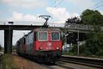 Durchfahrt am 11.07.2014 von SBB Cargo/HSL Re 421 387-2 mit SBB Cargo/HSL Re 421 383-1 und SBB Cargo/TXL Re 421 391-4 als Lokzug in Orschweier gen Süden.