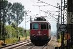 Nachschuss auf SBB Cargo/TXL Re 421 391-4, die am 11.07.2014 am Schluss eines Lokzuges mit SBB Cargo/HSL Re 421 387-2 als Zuglok und SBB Cargo/HSL Re 421 383-1 hing und hier kurz hinter dem Bahnhof