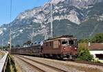 Die BLS Re 4/4 Nr. 189  Niedergesteln  wird im Bild in Kürze den Bahnhof Mols durchfahren. Sie fuhr dann am Morgen des 23. September 2017 mit dem Autozug weiter in Richtung Sargans.