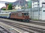 BLS - Re 4/4 192 vor Regio bei der einfahrt in den Bahnhof Spiez am 15.05.2010