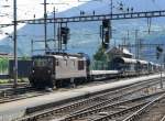 BLS - Autozug von Iselle nach Kandersteg mit der Lok Re 4/4 191  bei der durchfahrt im Bahnhof Brig am 19.07.2015