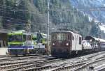 Re 4/4 178 vor einen Ltschberg Autozug im Bahnhof von Goppenstein neben dem Baudienst Tm 2/2 235 208-0  am 10.03.2007