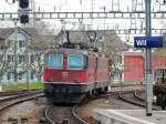 SBB - Nachschuss der Re 4/4 11360 mit Re 4/4 11182 beim verlassen des Bahnhofs Wil am 27.04.2012