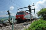 Re 416-016 der Sdostbahn mit einem einzigen Wagen, der sicher wieder instandgesetzt wird, bei Frick (Aargau).