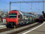 Die Werbe S-Bahn von Zrich am 29.08.2008 bei der Ausfahrt als aus dem Zricher Hbf.