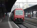 SBB - 450 022-9 als RE unterwegs im Bahnhof Aarau am 25.03.2013