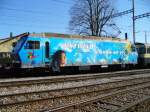 SOB - E - Lok Re 4/4  456 143-7 mit Vollwerbung abgestellt im Bahnhofsareal von Samstagern am 11.03.2007