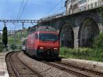 Die Re 460 062 mit einem IR am 28.06.2009 bei der Durchfahrt in St-Saphorin