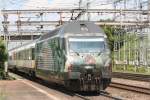 460 075 am 16.07.09 in Muttenz mit EW4 Pendelzug nach Basel.