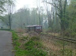 SBB Re 460 104-3 und noch ein 460 mit einem Holzschnitzelzug am 30.07.03 bei Ausserberg  Ltschberg Sdrampe 