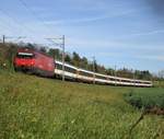 Die SBB Re 460 073-0  Monte Ceneri  verkehrte mit dem IR 2130 von Konstanz nach Zürich HB zwischen Bassersdorf und Baltenswil an mir vorbei.