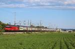 Die SBB Re 460 072-2  Reuss   unterwegs mit dem IR 70 zwischen Bassersdorf und Kloten.