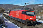 Re 460 090-4 ist unterwegs in Richtung Basel, aufgenommen in Hornussen AG am Nachmittag des 14.02.2021.