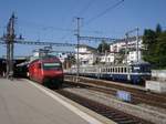 Die SBB-Re 460 091-2 und ein abgestellter BLS-EW I-Pendel mit dem Bt 951 am 15.