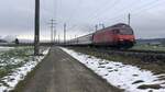 Die SBB Re 460 089 mit IC 61 nach Interlaken Ost in Kiesen BE  