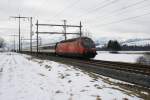 Re 460 069-8 fhrt mit dem Ersatz-Cisalpino am 20.2.09 von Wichtrach Richtung Mnsingen.