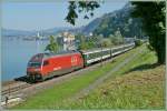 Re 460 IR nach Brig beim Chteau de Chillon am 24.