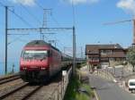 460 025-0 mit einem Intercity durchfhrt Grandvaux.