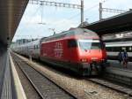 SBB - 460 057-3 mit Schnellzug bei der einfahrt in den Bannhof Spiez am 01.07.2011