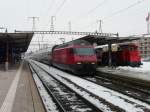 SBB - Lok 460 052-4 bei der durchfahrt im Bahnhof Nyon am 14.02.2013