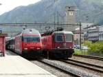 SBB - 460 055-7 mit IR neben Re 6/6 11657 im Bahnhof Sion am 01.05.2013