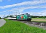 Re 460 087-0 mit RE 3223 bei Lyssach, 20.05.2013.