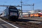 SBB: Frontansicht der Re 460 105-0 mit RE 3217 bei einem Zwischenhalt in Langenthal am 9.