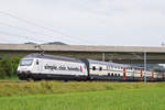 Re 460 071-4, mit der Helvetia Werbung, fährt Richtung Bahnhof Sissach.