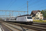 Re 460 113-4 mit der Werbung für 100 Jahre SEV, durchfährt den Bahnhof Rupperswil.